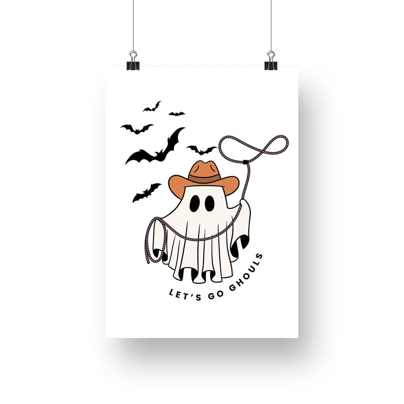 May include: A white ghost wearing a brown cowboy hat and holding a lasso. The ghost is surrounded by black bats and the text "Let's go ghouls".