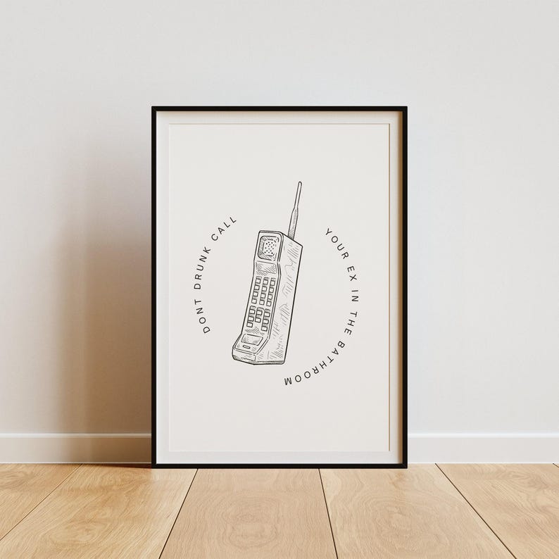 May include: Black and white illustration of a vintage cell phone with the text "Don't drunk call your ex in the bathroom" around it.
