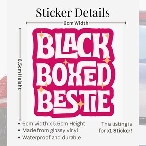 May include: A white ceramic mug with a black handle and the text "But First, Coffee" in a bold, black font. The mug is sitting on a wooden surface. The mug is approximately 4 inches tall.