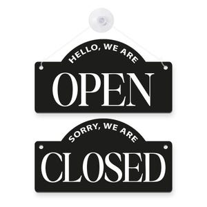 May include: Two black hanging signs with white text. The top sign reads "HELLO, WE ARE OPEN". The bottom sign reads "SORRY, WE ARE CLOSED". A white suction cup and string are attached to the top sign.