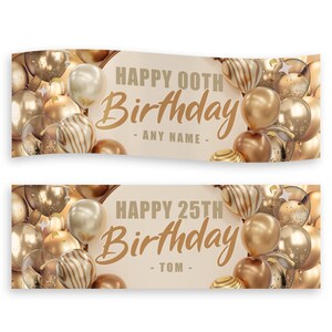 May include: Two birthday banners with gold balloons and the text "HAPPY 00TH BIRTHDAY - ANY NAME -" and "HAPPY 25TH BIRTHDAY - TOM -". The banners have a cream background and gold text.