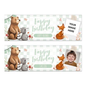 May include: A banner with a woodland theme, featuring a brown bear, a gray raccoon, and a fox. The banner says "Happy Birthday" and has space for a photo. The background is a light green and white checkered pattern.