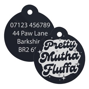 May include: Black round pet ID tag with white text. The tag has a phone number, address, and the text "Pretty Mutha Fluffa".