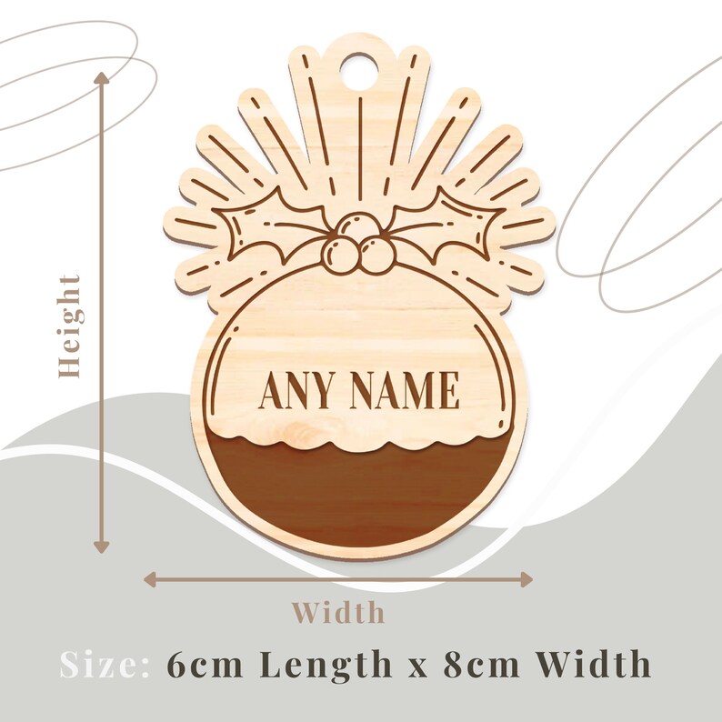 May include: A wooden Christmas ornament shaped like a Christmas pudding with a holly sprig on top. The ornament is 6 cm long and 8 cm wide. The ornament is personalized with the text "ANY NAME".
