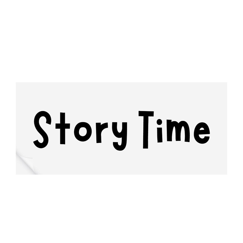 May include: White sticker with black text that reads "Story Time".