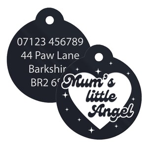 May include: Black round pet ID tag with white text. The tag has a phone number, address, and the text "Mum's little Angel" inside a white heart with stars.