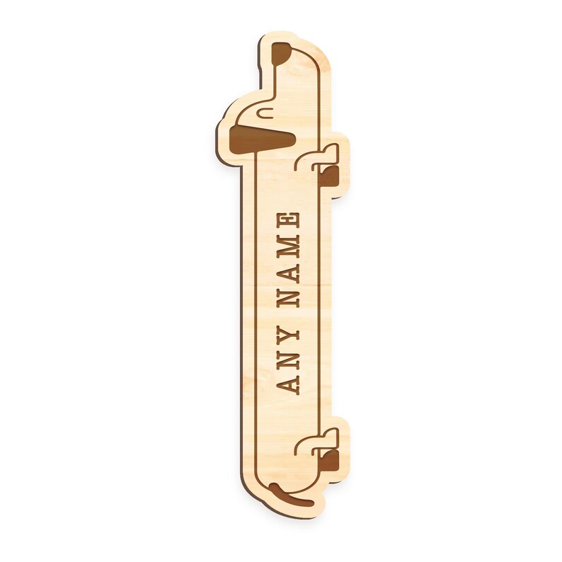 May include: Wooden bookmark with a dachshund design. The bookmark has a space for a name, "ANY NAME", to be engraved.