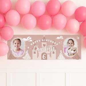 May include: A pink birthday banner with the text "Happy Birthday Charlotte 6" and two photos of a young girl. The banner has a castle design and is surrounded by pink balloons.