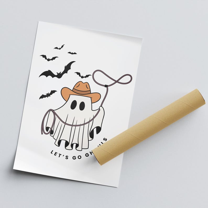 May include: A white ghost wearing a brown cowboy hat and holding a lasso. The ghost is surrounded by black bats and the text "Let's go ghouls" is written below the ghost.