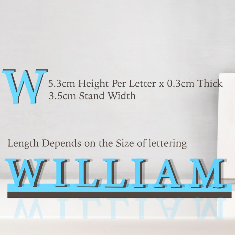 May include: A blue and black wooden name sign with the name "WILLIAM" in large, bold letters. The sign is 5.3 cm high per letter, 0.3 cm thick, and has a 3.5 cm stand width. The length of the sign depends on the size of the lettering.