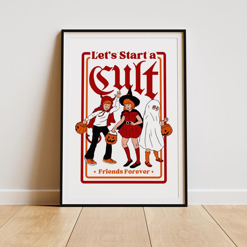 May include: A framed print featuring three children in Halloween costumes. The image includes a child dressed as a devil, a witch, and a ghost, each holding a jack-o'-lantern. The text reads "Let's Start a Cult" and "Friends Forever."