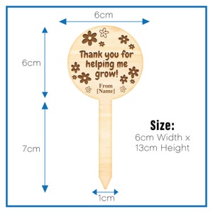 May include: Wooden garden stake with a round, brown sign that says "Thank you for helping me grow! From [Name]" with flowers around the text. The stake is 7 inches tall and 6 inches wide.