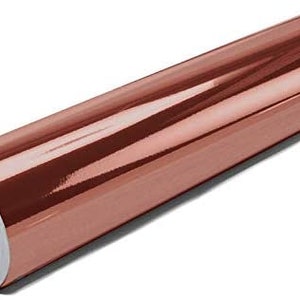 May include: A roll of copper-colored vinyl wrap with a glossy finish. The vinyl is rolled up and has a white core.