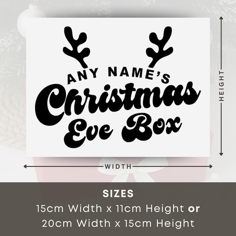 May include: A white rectangular sign with black text that reads "ANY NAME'S Christmas Eve Box." The sign features reindeer antlers above the text. Available in two sizes: 5.9" width x 4.3" height or 7.9" width x 5.9" height.