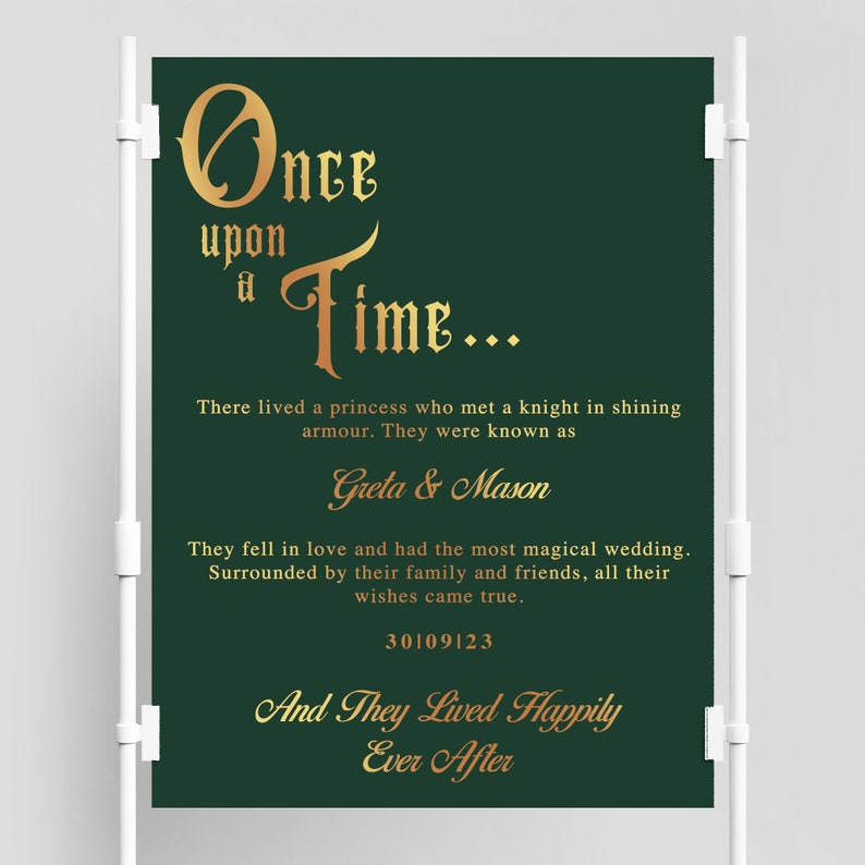 May include: A green wedding sign with gold lettering that reads "Once upon a time... There lived a princess who met a knight in shining armor. They were known as Greta & Mason. They fell in love and had the most magical wedding. Surrounded by their family and friends, all their wishes came true. 30/09/23 And They Lived Happily Ever After."