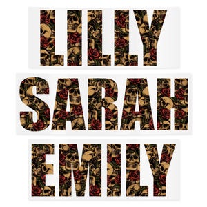 May include: Three rectangular stickers with the names "LILLY", "SARAH", and "EMILY". Each name is filled with a pattern of skulls and red roses. The stickers have a white background.