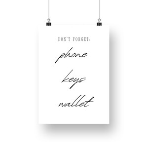 May include: A white printable poster with black text that reads "Don't Forget: phone keys wallet".