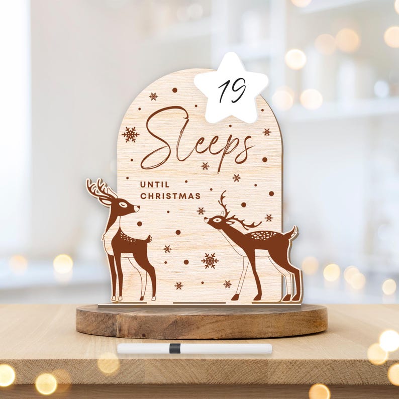 May include: Wooden Christmas countdown sign with two reindeer silhouettes and the text "19 Sleeps Until Christmas".
