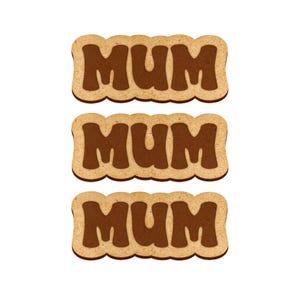 May include: Three brown wooden signs with the word "MUM" written in brown letters on each sign.