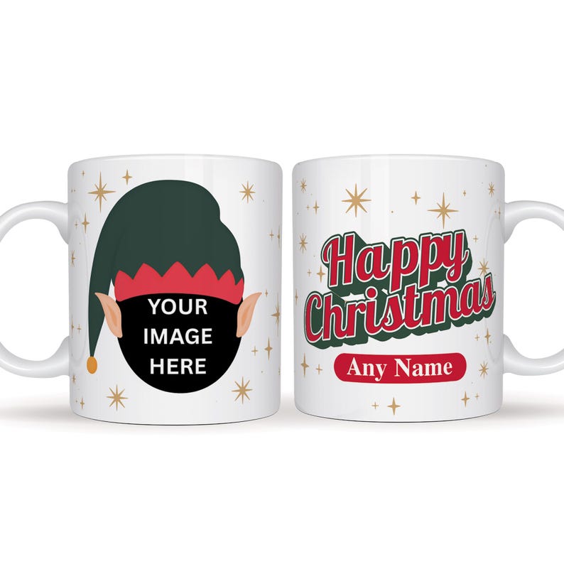 May include: White ceramic Christmas mug. One side has an elf graphic with the text "YOUR IMAGE HERE". The other side displays "Happy Christmas" in red and green, with space for a name. Festive design with star accents.