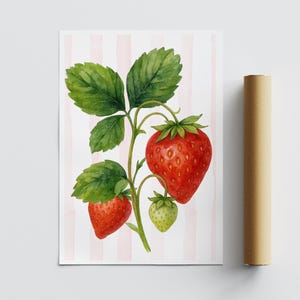 May include: Watercolor print of a strawberry plant with ripe red berries and green leaves. The artwork features a light pink and white striped background. A rolled-up poster is visible on the right side of the image.