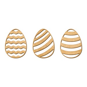 May include: Three wooden Easter egg cutouts with different patterns. The first egg has a wavy pattern, the second has diagonal stripes, and the third has horizontal stripes.