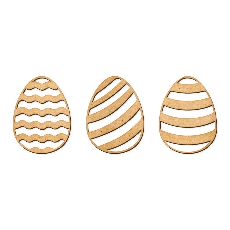 May include: Three wooden Easter egg cutouts with different patterns. The first egg has a wavy pattern, the second has diagonal stripes, and the third has horizontal stripes.