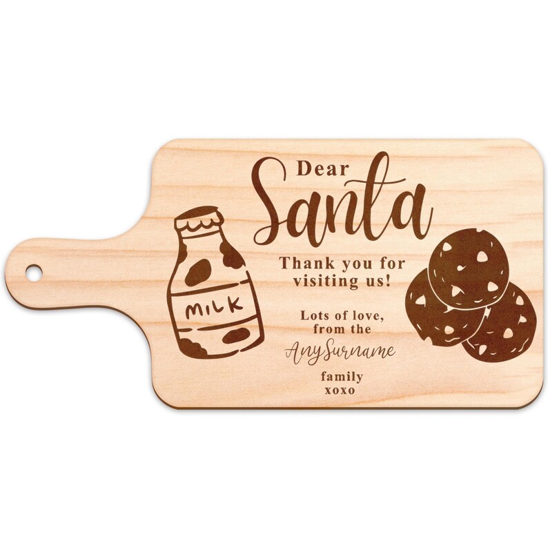 May include: Wooden serving board with a handle, engraved with a milk bottle, cookies, and the words "Dear Santa, Thank you for visiting us! Lots of love, from the [AnySurname] family xoxo."