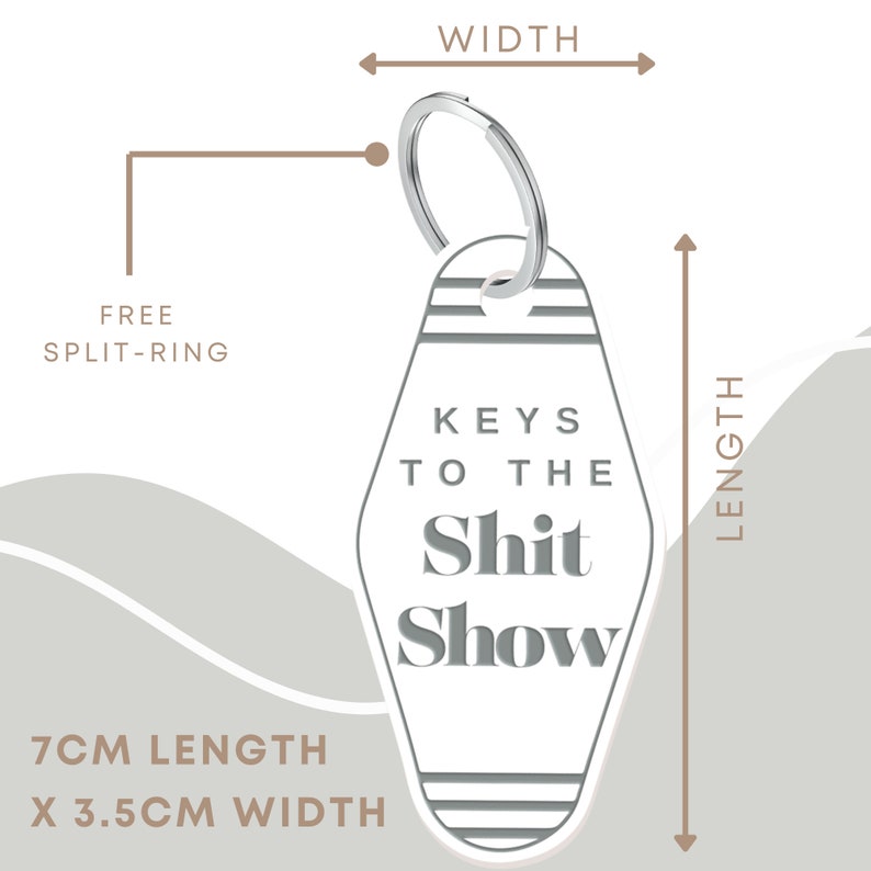 May include: White motel key chain with black text that reads "Keys to the Shit Show". The keychain is 7 cm long and 3.5 cm wide and includes a free split ring.