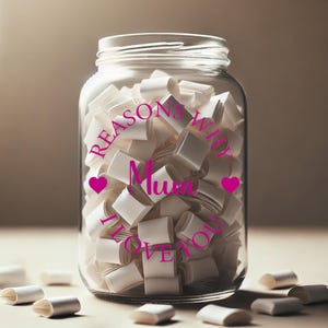 May include: A glass jar with a pink label that reads "Reasons Why Mum I Love You" with two pink hearts. The jar is filled with white paper slips.