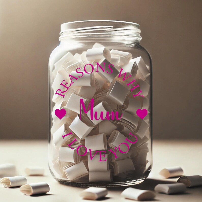 May include: A glass jar with a pink label that reads "Reasons Why Mum I Love You" with two pink hearts. The jar is filled with white paper slips.