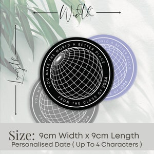 May include: Two round black and white coasters with a globe design and the text "You make the world a better place from the class of 2024". The coasters are 9 cm in diameter.