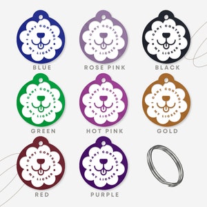 May include: A set of nine dog tags in various colours, including blue, rose pink, black, green, hot pink, gold, red, and purple. Each tag features a white dog silhouette with the text "I can't control my licker" in a circle.