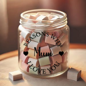 May include: A glass jar filled with rolled up pieces of paper with the text "Reasons Why I Love You Mum" on the front.