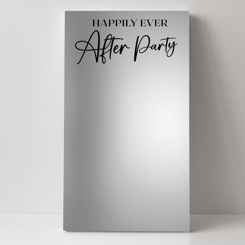 May include: A silver mirror with the text "Happily Ever After Party" in black lettering.