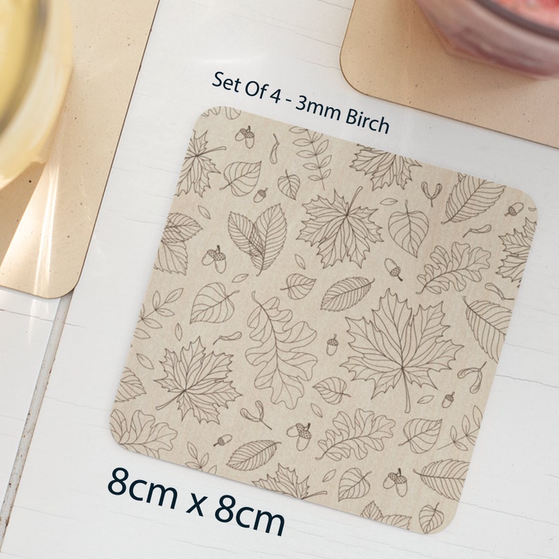 May include: Set of 4, 3mm birch wood coasters with a leaf pattern. Each coaster measures 8cm by 8cm.