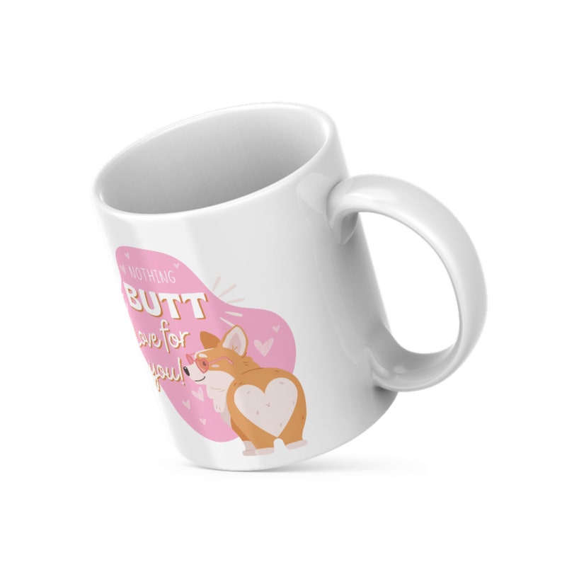 May include: White ceramic mug with a handle, featuring a cartoon corgi with sunglasses and a heart-shaped butt. The mug has the text "I have nothing BUT love for you!" on a pink background with hearts.