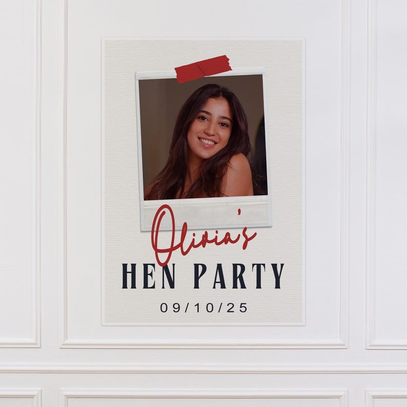 May include: A white poster with a photo of a woman, red tape, and text. The text reads "Olivia's HEN PARTY" and "09/10/25". The photo is in a white frame.