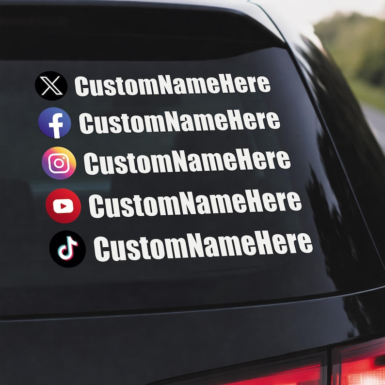 May include: Black car window decal featuring social media icons and the text "CustomNameHere". Icons include X, Facebook, Instagram, YouTube, and TikTok, all in white. The text is also white, creating a clean, modern look.