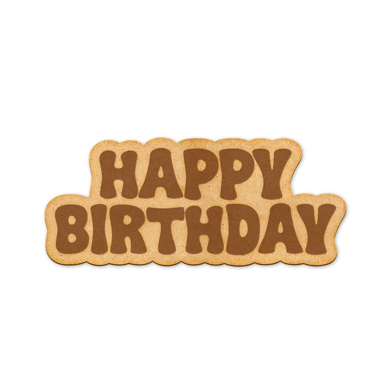 May include: A brown cardboard sign with the words "Happy Birthday" in brown lettering.
