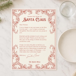 May include: A cream-colored letter from Santa Claus with red decorative borders and text. The letter is addressed to Thomas and signed by Santa Claus, with a message about being on the Nice List. The North Pole is also mentioned.