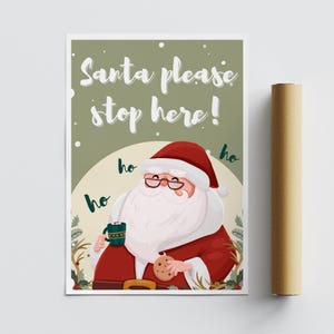 May include: A green and white Christmas card with a cartoon Santa Claus holding a cup of hot chocolate and a cookie. The card says "Santa please stop here!" with "ho ho ho" written around Santa.