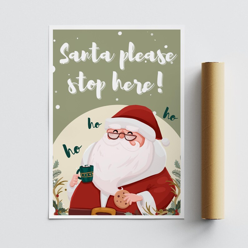May include: A green and white Christmas card with a cartoon Santa Claus holding a cup of hot chocolate and a cookie. The card says "Santa please stop here!" with "ho ho ho" written around Santa.