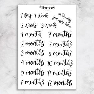 May include: A white sticker sheet with black handwritten text. The text includes phrases like "1 day", "1 week", "2 weeks", "1 month", and "on the day you were born". The "Tiiamari Print & Design" logo is at the top.