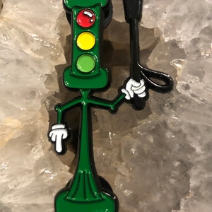 Slave naar de stoplichtpen