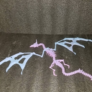 Articulated Dragon Skeleton With wings fidget flexi designed by @doll_maker_spb