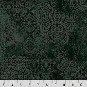 May include: Dark green fabric with a distressed, textured appearance. The fabric features a repeating pattern of floral and scroll designs in a lighter shade of green. The design is measured in inches.
