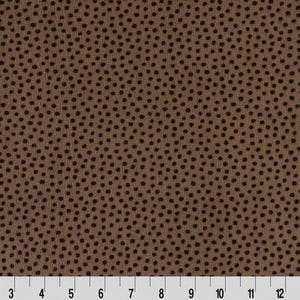 May include: Brown fabric with a repeating pattern of small black dots.