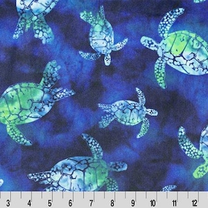 May include: Fabric with a repeating pattern of sea turtles in shades of blue and green against a dark blue background. The turtles have detailed shell patterns and are scattered across the fabric.