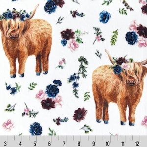 May include: White fabric with a repeating pattern of brown Highland cows wearing floral crowns. The cows are surrounded by blue, pink, and burgundy flowers and leaves.